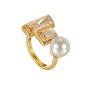 Vintage geometric gold ring with champagne zircon and pearl on a white background