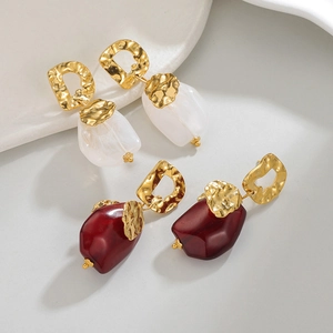 Vintage stainless steel gold textured earrings with white marble and ruby red stone drops