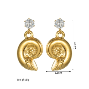 Detailed view of nautilus spiral pendant earrings with sparkling round zircon and gold finish