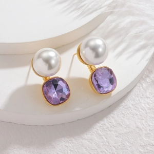 Elegant gold earrings featuring a white round pearl and a purple square zircon stone