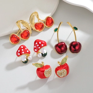 Elegant set of cherry, mushroom, and apple titanium steel studs with pearl accents