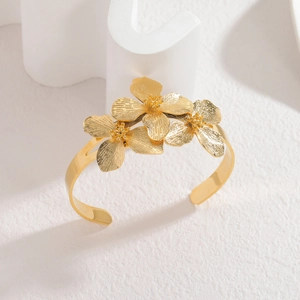 Vintage gold stainless steel wide open cuff bracelet with detailed 3D floral petals