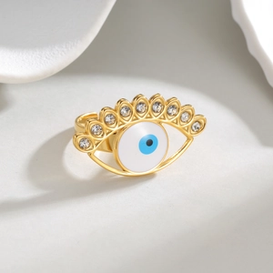 Golden evil eye open ring featuring sparkling crystals and blue zircon details