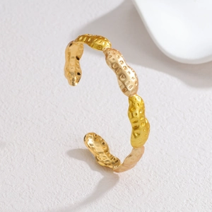 18k gold plated stainless steel open bangle with unique peanut shell textured finish