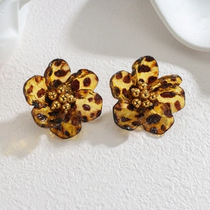 Retro leopard print flower earrings with amber acrylic petals and golden center