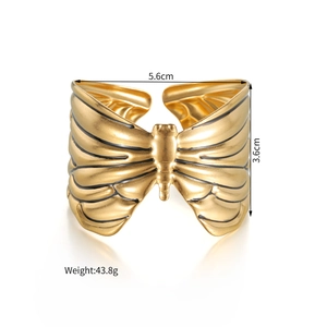 Detail showing vintage butterfly bangle dimensions 5.6cm width with black enamel