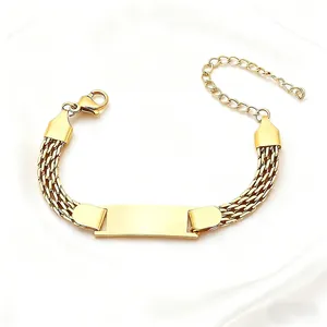 Macro shot of gold stainless steel woven mesh bracelet with blank engravable curved bar