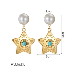 Detail view of vintage star turquoise earrings with white pearls and size annotations