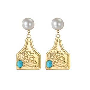 Vintage gold drop earrings with white pearls and turquoise stones in a retro boho style