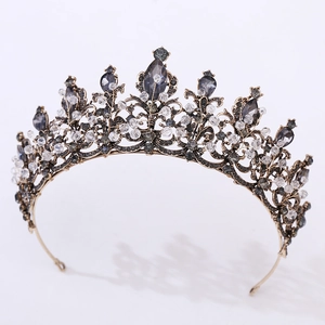 Detailed macro view of vintage Baroque black crystal beads and bronze base on bridal crown