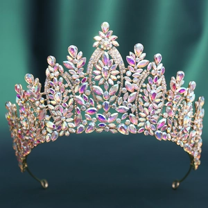Detail of baroque bridal crown with golden metal frame and iridescent AB crystals