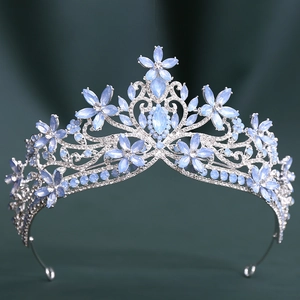 Detail view of Baroque crystal bridal crown with blue rhinestones and floral alloy base