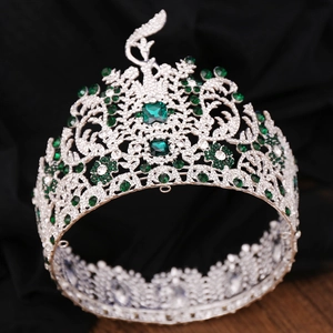 Baroque emerald green tiara with swan design and crystals on silver frame