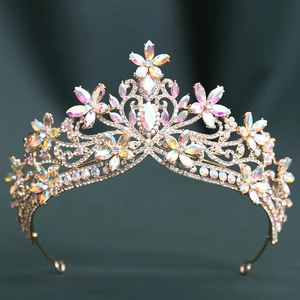 Detailed close-up of Baroque gold bridal crown with floral crystals and AB rhinestones
