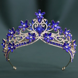 Detail of baroque bridal crown with blue crystal flowers and gold alloy frame
