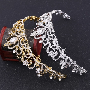 Detailed close-up of bridal crowns in gold and silver finish with sparkling rhinestones