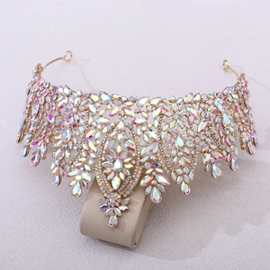 Detailed macro of crystal bridal tiara with iridescent rhinestones and gold alloy frame