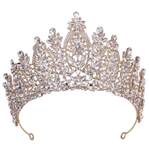 Detailed view of silver bridal tiara featuring floral crystal patterns and alloy base