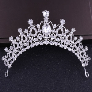 Elegant silver bridal tiara with sparkling pear-cut rhinestones on black background