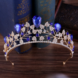 Baroque golden leaf bridal crown with teardrop blue crystals and sparkling rhinestones