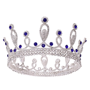 Sparkling silver bridal crown with white rhinestones and deep blue teardrop gems