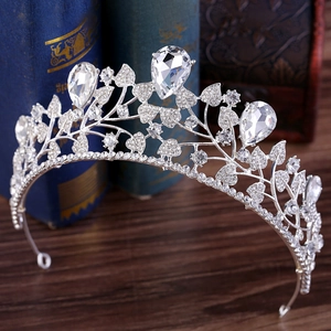 Elegant Baroque silver bridal tiara with leaf design and teardrop crystals for weddings
