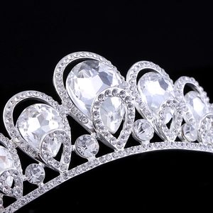 Elegant bridal tiara with sparkling rhinestones and teardrop crystals on silver metal