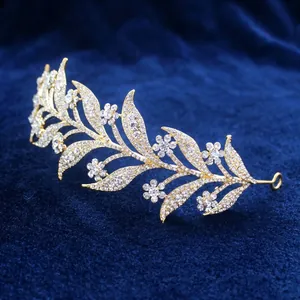 Elegant gold leaf bridal crown with sparkling white rhinestones and floral alloy design
