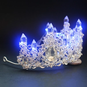 Silver LED bridal crown with sparkling crystals and blue glowing lights for parties