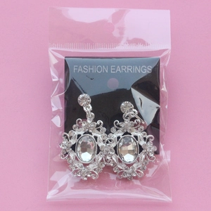 Silver vintage oval crystal drop earrings for brides with sparkling rhinestone accents