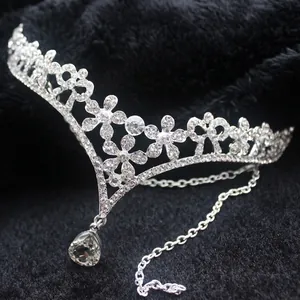 European bridal flower rhinestone tiara with elegant silver pendant on black background