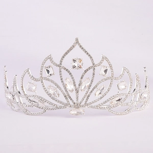 Elegant silver bridal tiara with sparkling rhinestones and crystal flower petals on white background