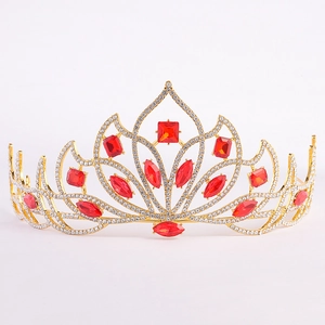 Elegant gold bridal crown with red gemstones and crystals in vintage court style