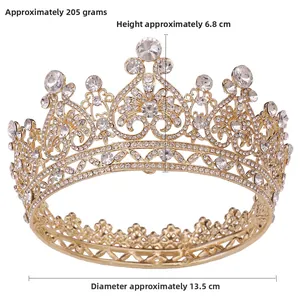 Detail of gold baroque crown showing 13.5cm diameter and 6.8cm height with rhinestones