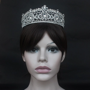Close-up of luxury silver bridal crown with intricate crystals and Baroque alloy patterns