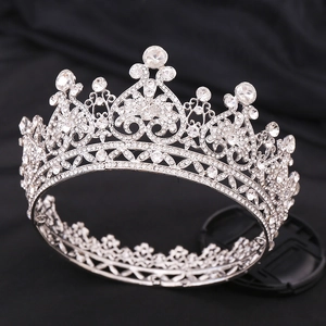 Detail view of Baroque silver crown with sparkling round and pear-cut clear rhinestones