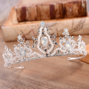 Macro detail of bridal crown featuring teardrop opals and sparkling rhinestones