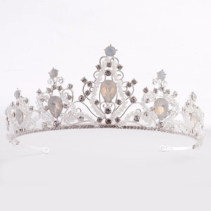Detailed macro view of silver bridal tiara featuring water-drop moonstones and small beads
