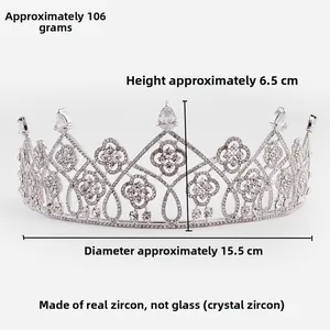 Detailed dimensions of silver zirconia tiara showing 6.5cm height and 15.5cm diameter