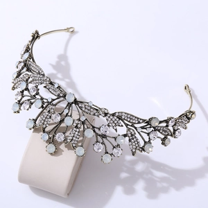 Vintage bridal crown with leaf design, bronze alloy base, rhinestones, and white opal stones