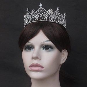 Macro detail of silver bridal tiara with sparkling rhinestones and teardrop jewels