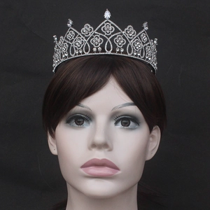Macro detail of the silver tiara with clear rhinestones and pear-cut zircon stones