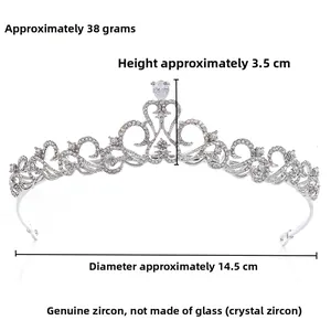 Detail of silver bridal tiara with cubic zirconia featuring 3.5cm height and 14.5cm diameter