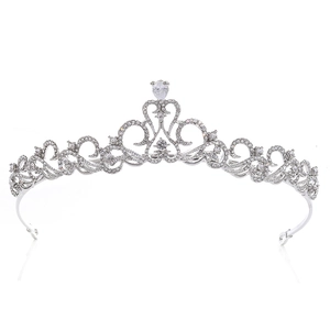 Sparkling silver bridal tiara with heart patterns and a teardrop crystal on mirror base