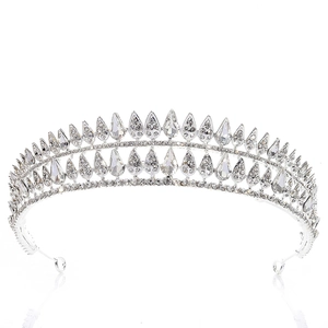 Close-up of teardrop crystals and sparkling rhinestones on the silver bridal crown