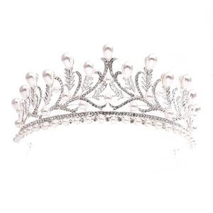 Detailed close-up of bridal leaf crown with silver plating, pearls and sparkling rhinestones
