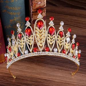 Baroque gold leaf crown with red teardrop crystals and sparkling white rhinestones