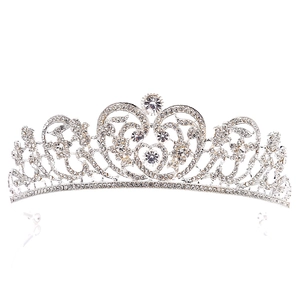 Close-up of elegant silver bridal tiara with sparkling rhinestones and leaf patterns
