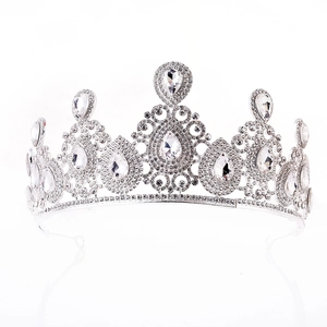 Detail view of silver bridal tiara with waterdrop rhinestones and symmetrical alloy patterns