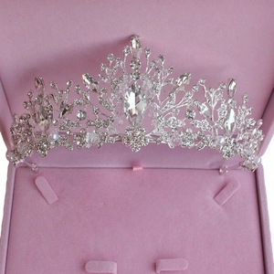 Elegant bridal tiara set with silver rhinestones and pearls in a pink velvet jewelry box